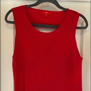 Red knitted dress. Cut out in the back.